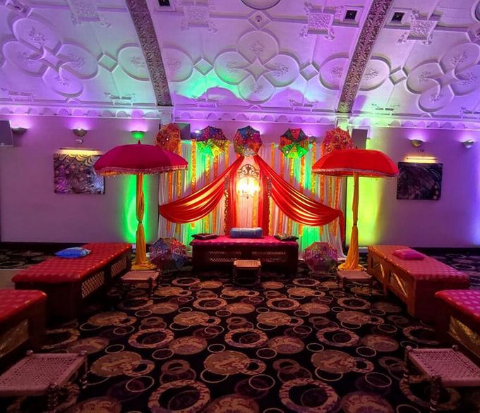 event set up at venue with colorful uplighting